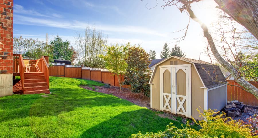 Fenced backyard with storage shed in Long Beach